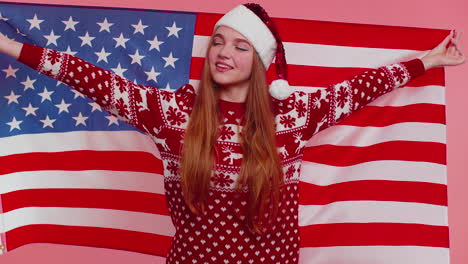 Christmas-adult-girl-waving-and-wrapping-in-American-flag,-celebrating,-human-rights-and-freedoms