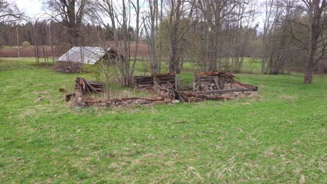 ruins of antique wooden homestead, close in gimbal shot