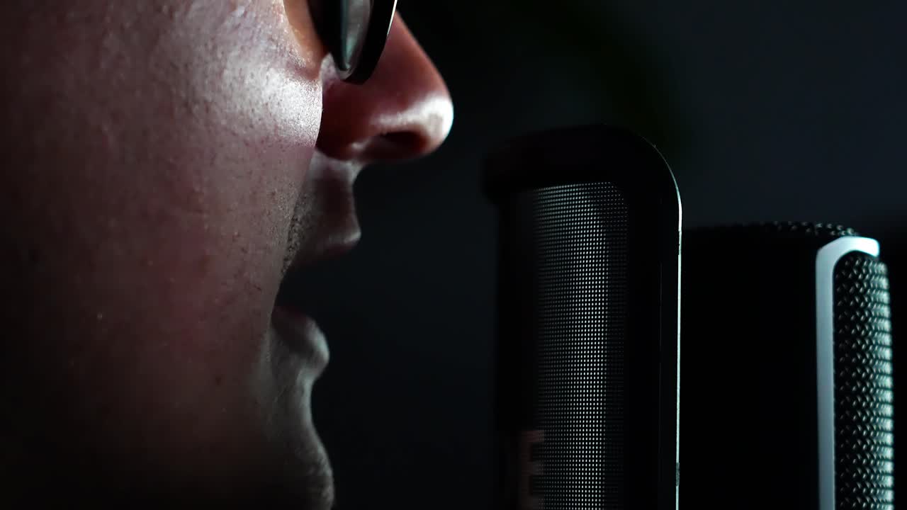 man doing a voice over, Capturing Sound: Voice Recording Session