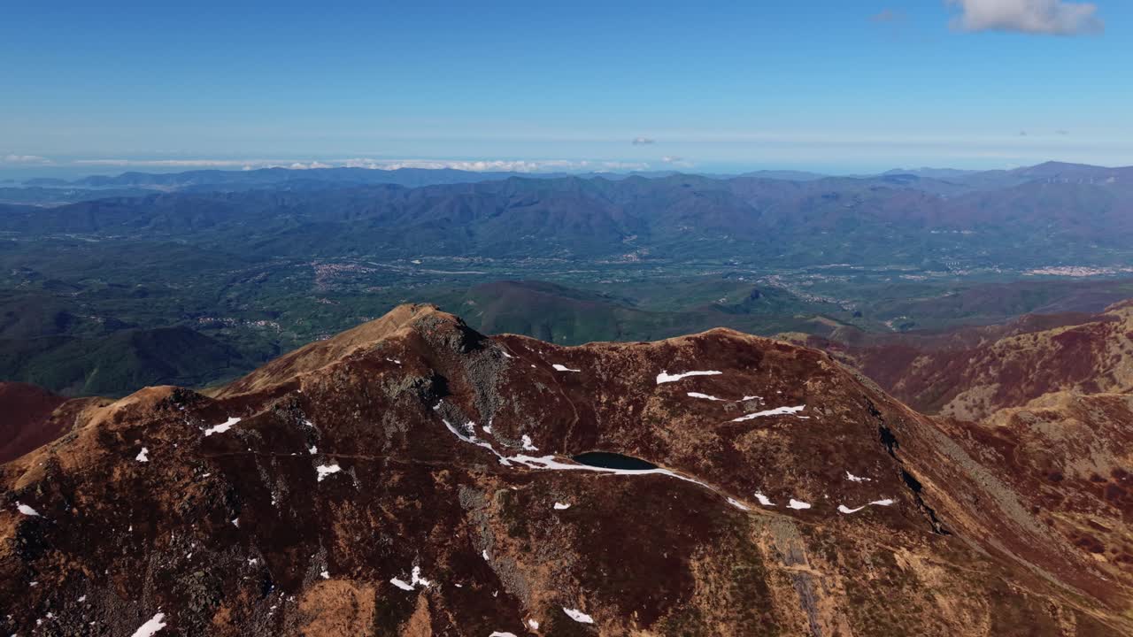 Stunning aerial view of the Dolomites Mountains showing rocky terrain and expansive landscape