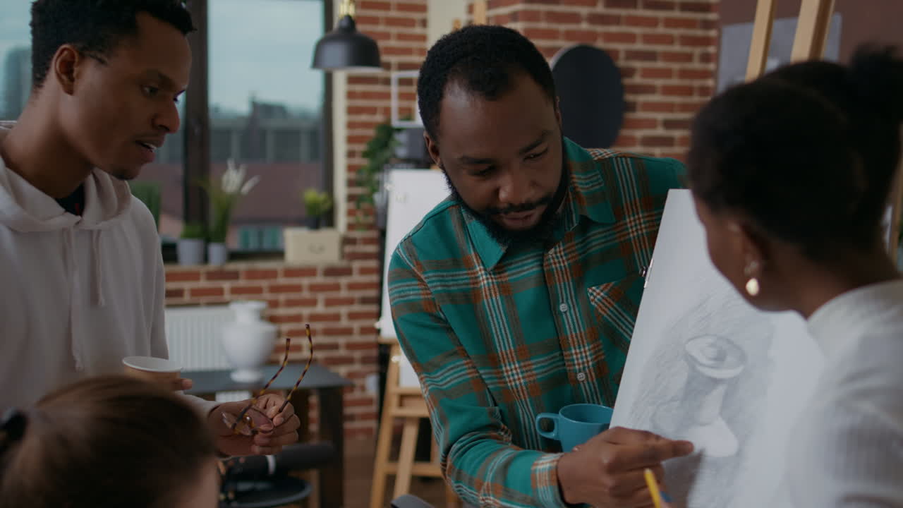 Group of artistic people brainstorming ideas to create drawing