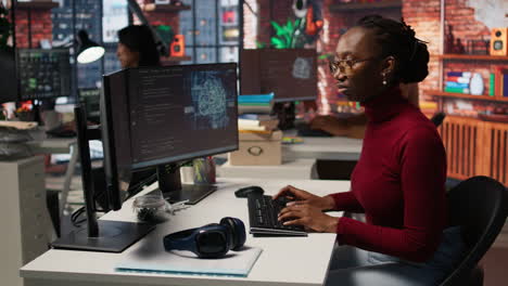 programmer coding artificial intelligence algorithms in startup
