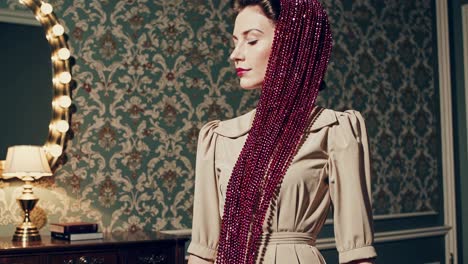 vintage woman in beaded headpiece