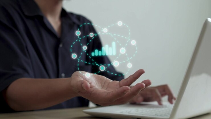 Businessman analyzing corporate metrics with floating holographic bar graph and data nodes in palm