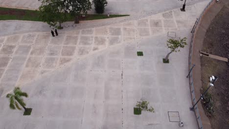 People-enjoying-at-drive-in-Posadas-alongside-road,-Argentina,-Aerial-view