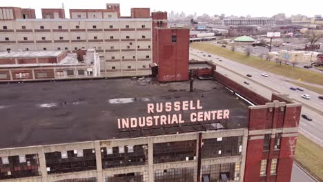 vintage building of russel industrial center in downtown michigan, aerial shot