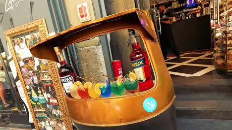 colorful drinks and campari bottles on display