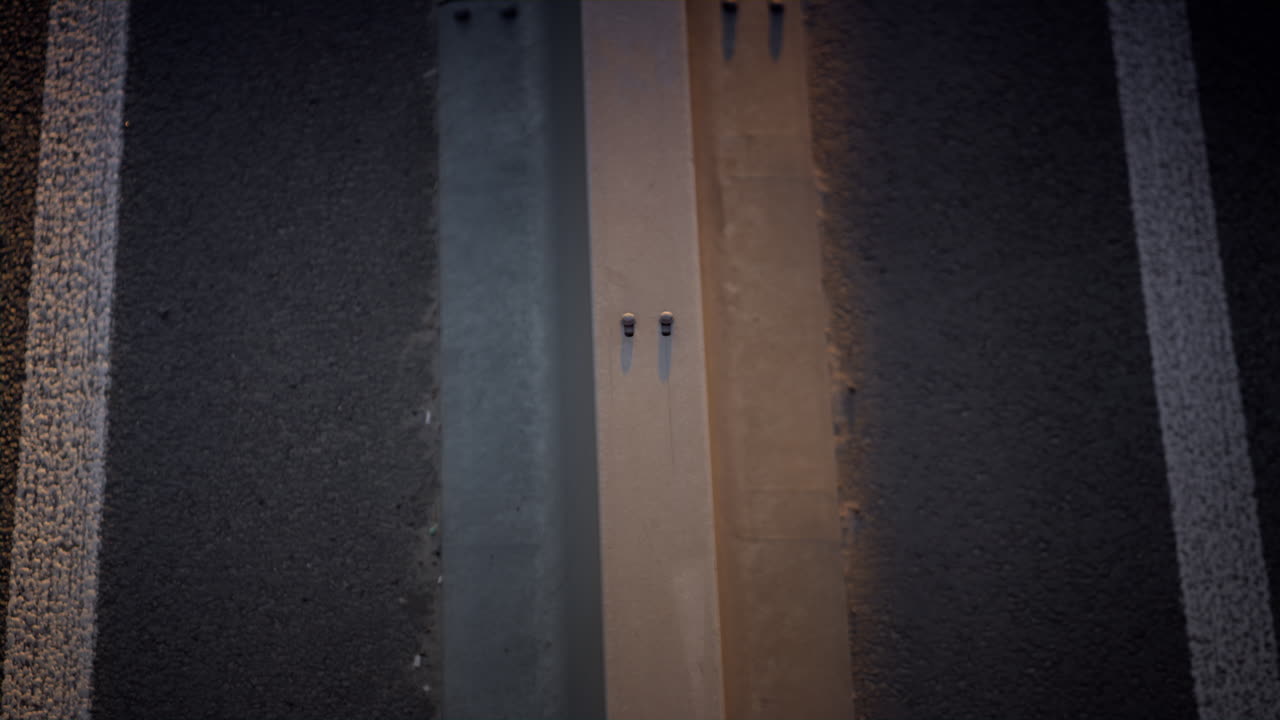 Closeup car driving highway in morning. Freeway crash barrier view drone shot.