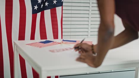 Handheld-video-of-black-man--voting-in-face-mask