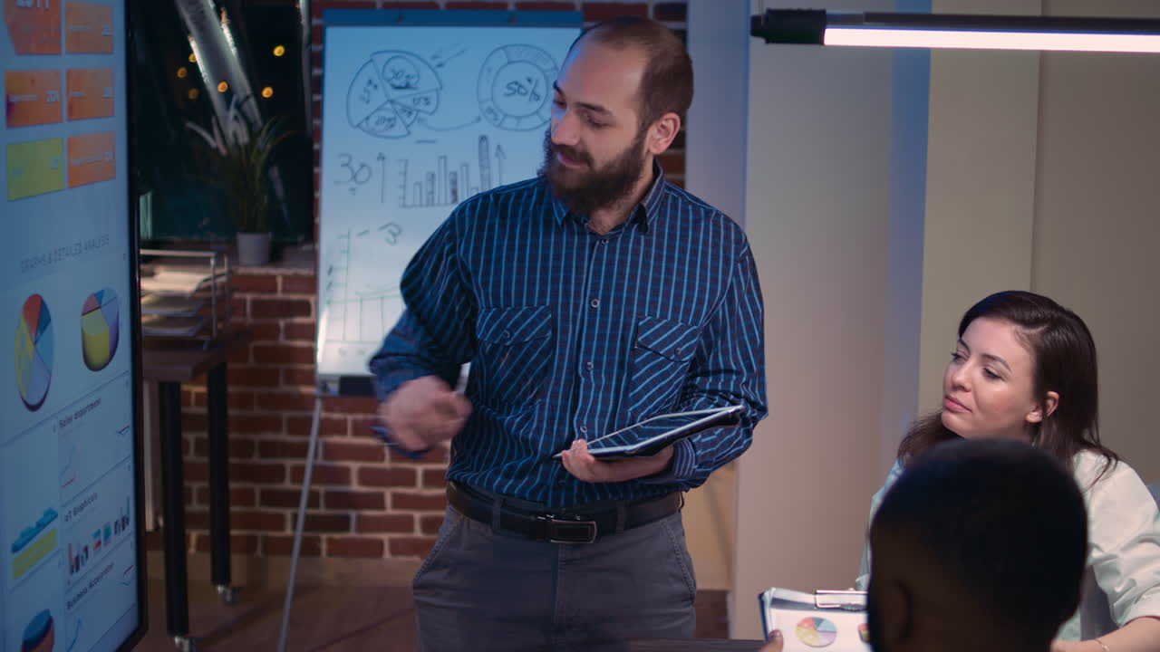 Company analyst speaking in business meeting in coworking space