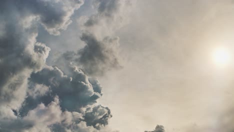 4k sun in the dark and dramatic storm clouds