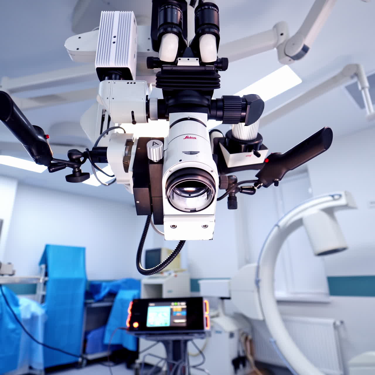 Innovative microscope inside the operating room. Empty surgery with modern medical equipment in advanced hospital.