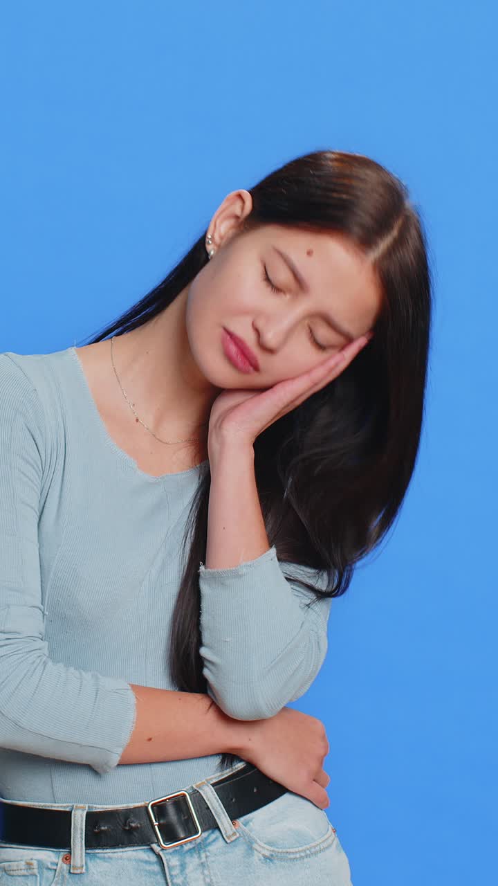 Tired sleepy young woman yawning feeling somnolent lazy bored gaping suffering from lack of sleep