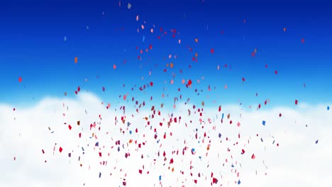 Animation-of-multi-coloured-confetti-falling-over-blue-sky-and-clouds
