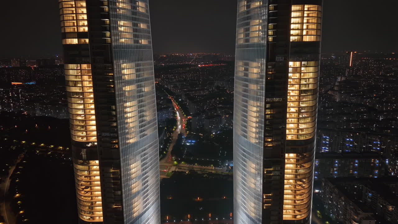 Illuminated Modern Skyscrapers and City at Night
