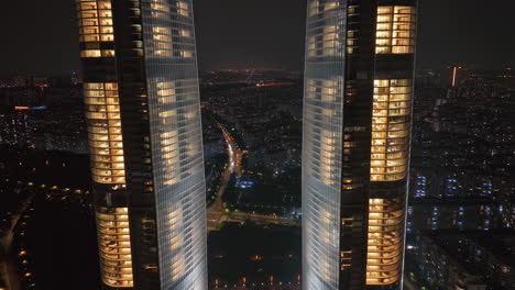 illuminated modern skyscrapers and city at night