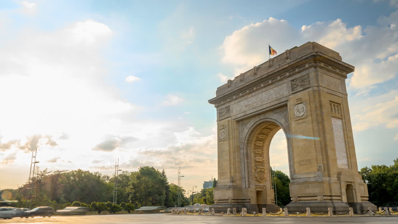 Time lapse of cars moving near the Triumphal Arch of Bucharest, Romania