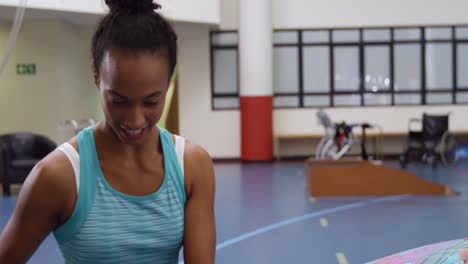 woman exercising with a prosthetic leg