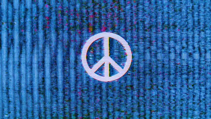Repeating peace sign glitches with blue and green noise static