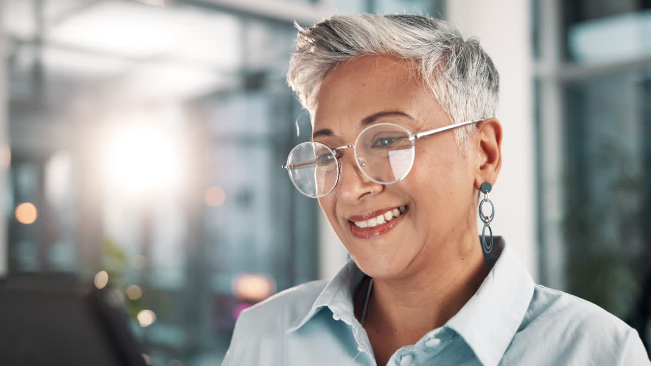 Smiling businesswoman with glasses