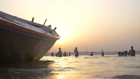 Downward-Panning-of-Men-Bathing-in-River-Ganges