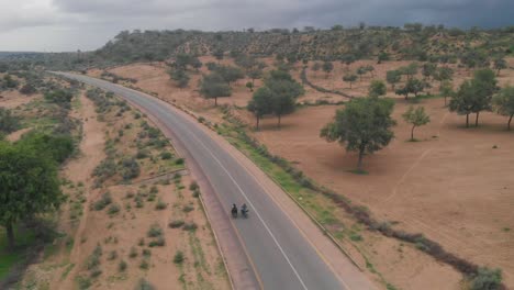 drone captures two biker racing in the isolated