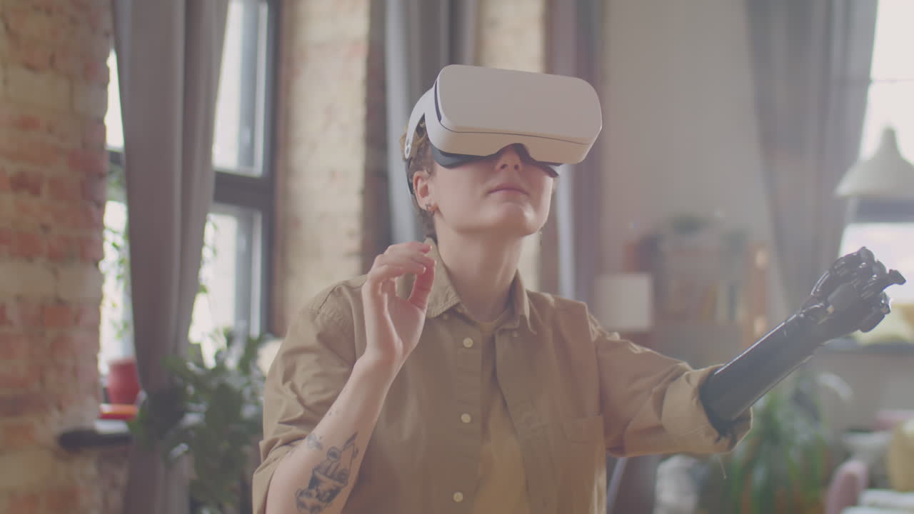 Girl with Prosthetic Arm Playing Video Game with VR Headset at Home