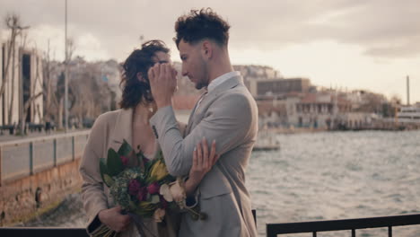 romantic couple portrait at the waterfront