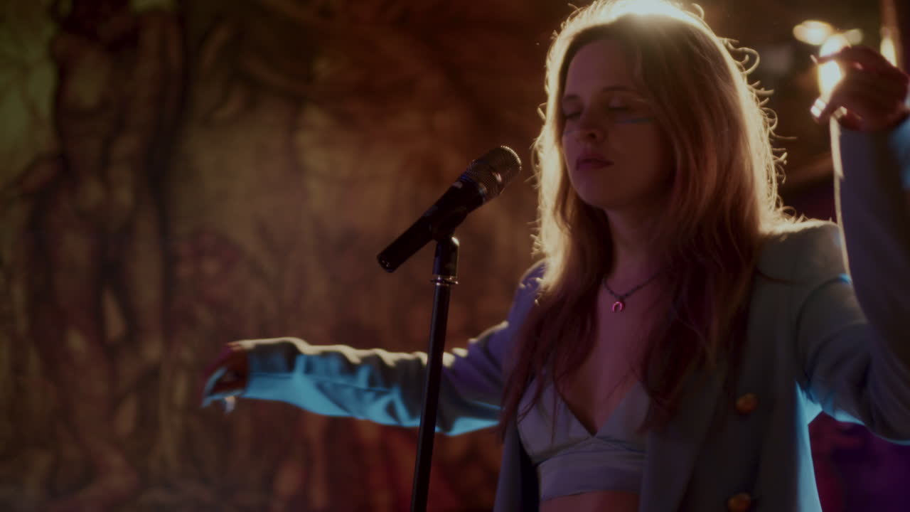 Woman Singer Performing on Stage