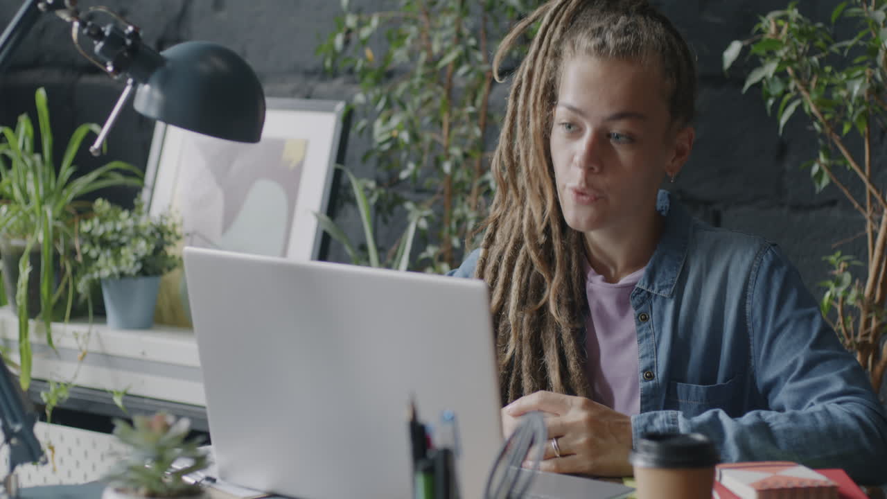 Woman working from home on laptop