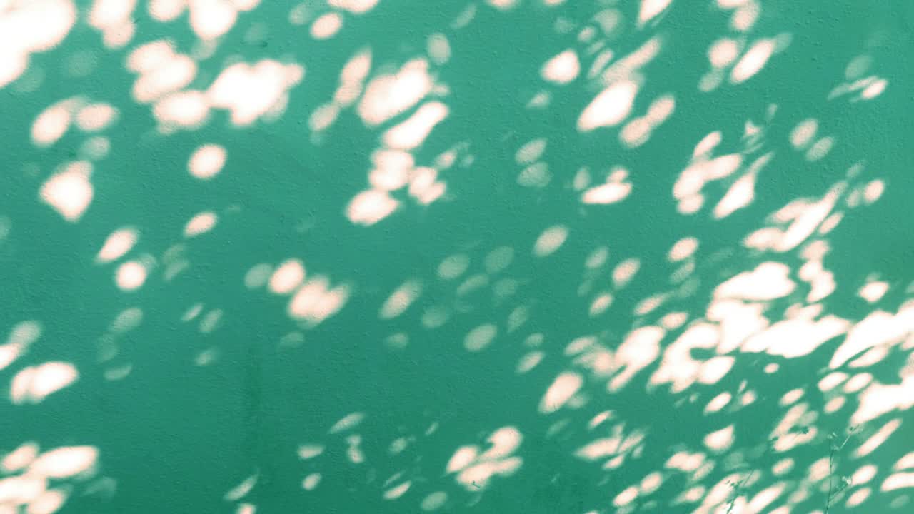 cyan blue cement wall n Bokeh sun light ray or sunlight shadow
