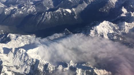 a slow motion clip of the cascade mountains taken from a plane