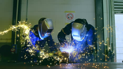 animation of glowing shooting star over male engineers welding