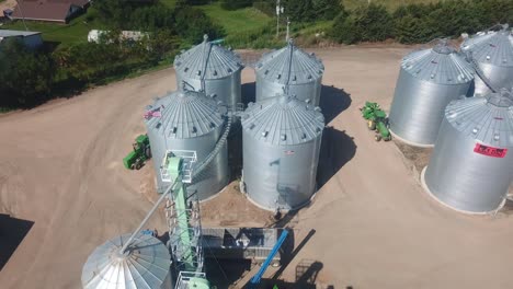 Aerial-view-of-the-storage-bins,-warehouses,-tractors-and-trailers-of-agribusiness,-that-exports-seeds-around-the-world---Nebraska-USA