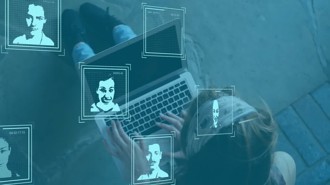 Using facial recognition animation, person working on laptop in school setting