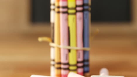 close-up of colorful crayons and chalk