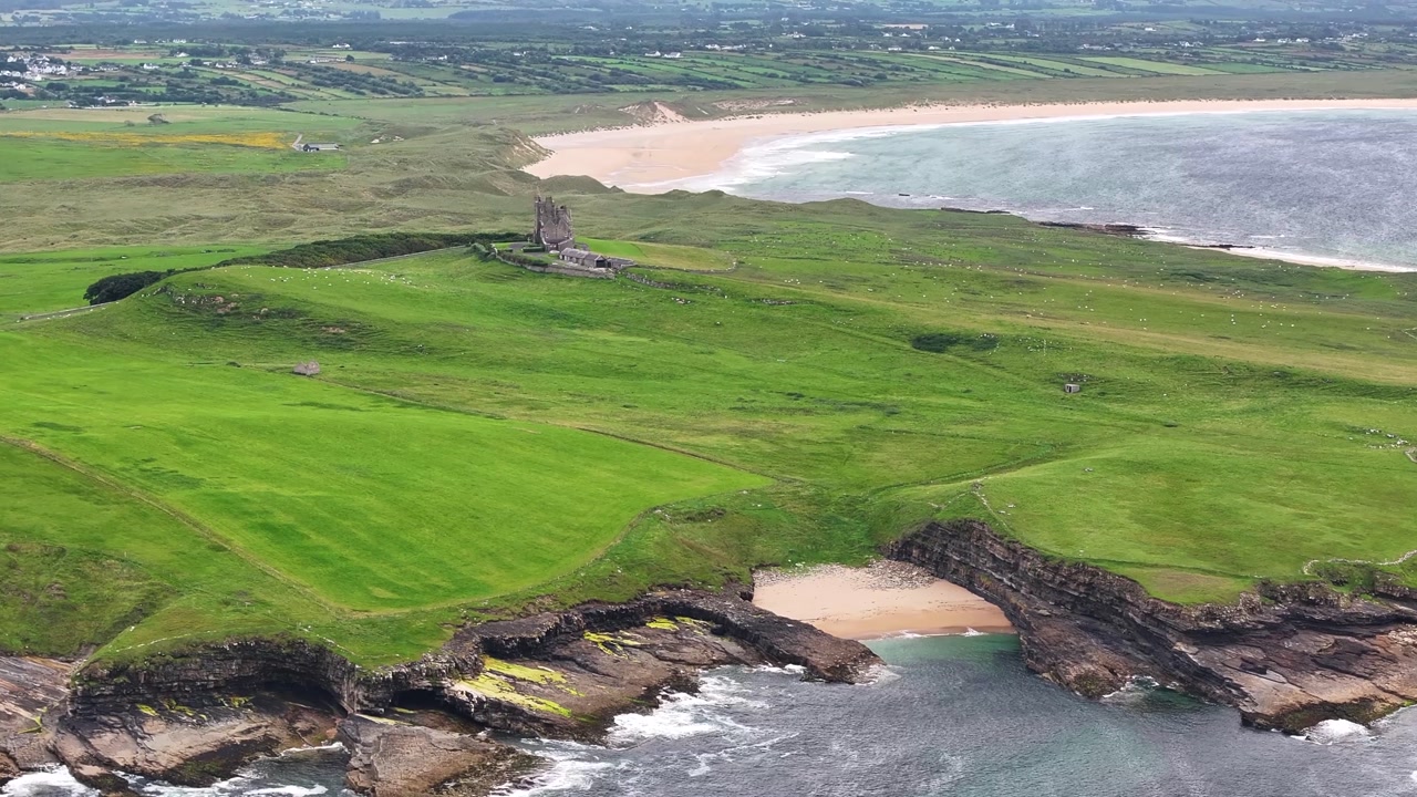 Aerial scenic view over rugged cliff, Mullaghmore Castle to foggy mountain top. Co. Sligo Ireland