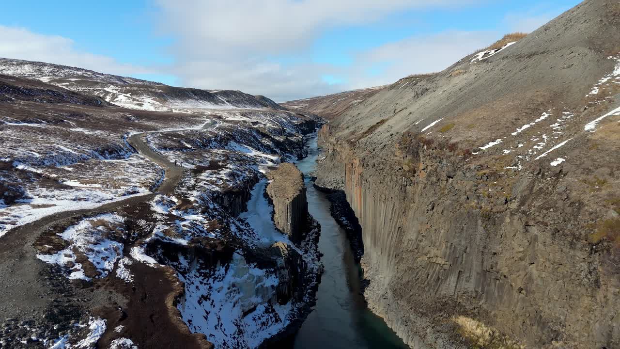 scenic aerial Iceland drone footage of Stuðlagil Canyon Jökulsá á Dal River in the Jökuldalur valley