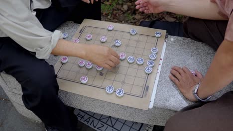 banqi, chinese dark chess board game played in street, taiwan