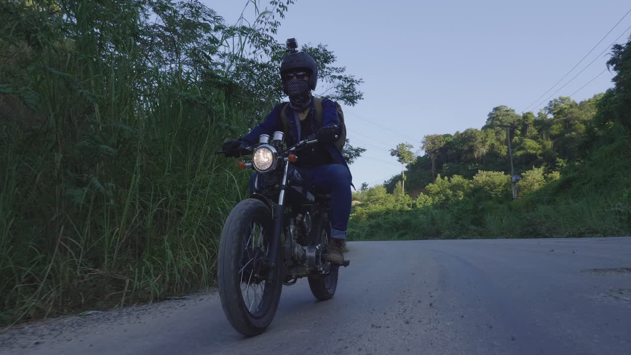Motorcycle rider on a rural road