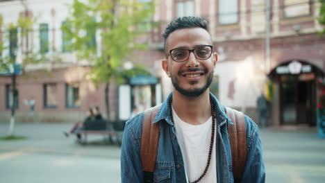 smiling man in city street