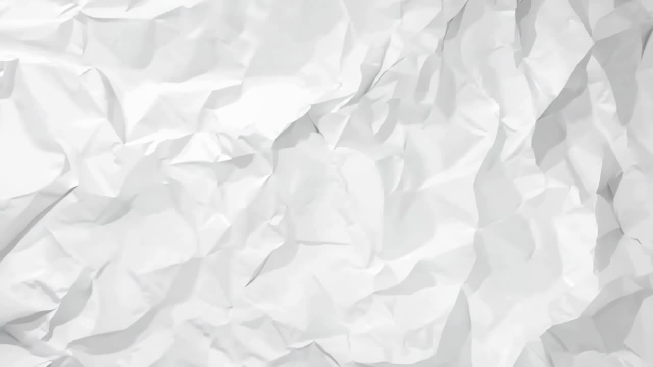Abstract low-poly white background, top-down angle. The geometric design creates a modern