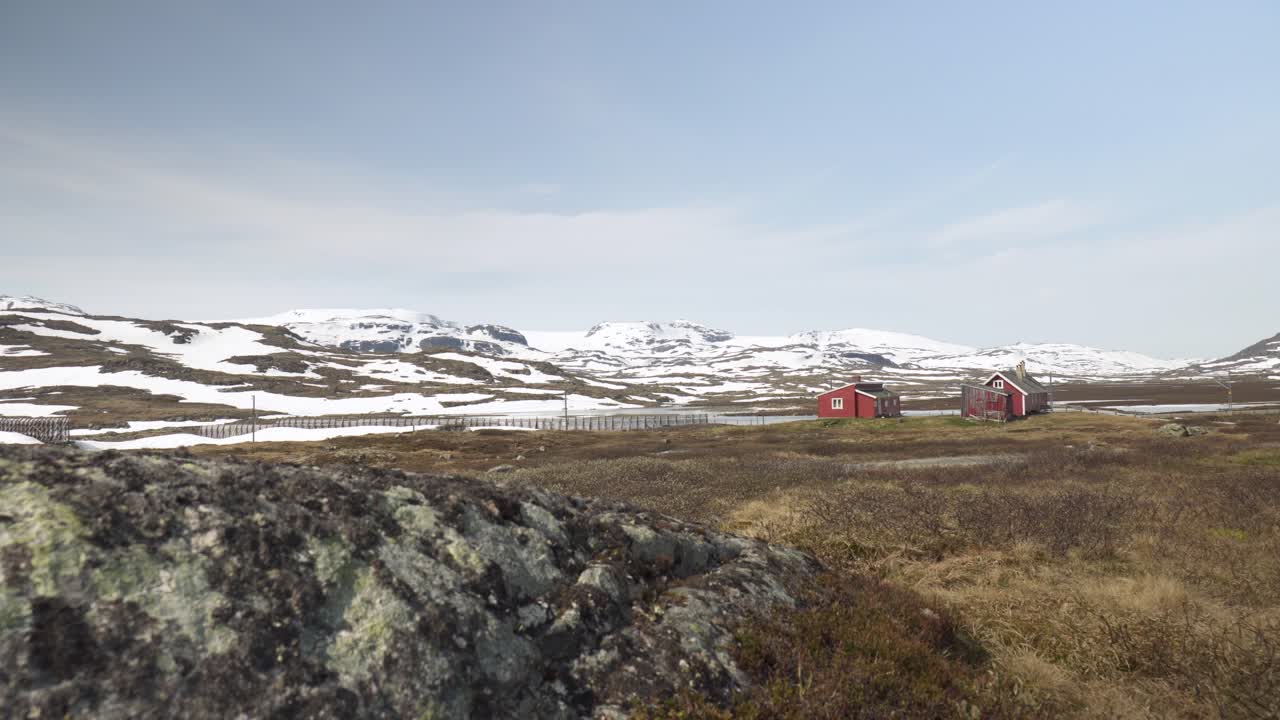 Bicycle On The Road Through Hardangerjokulen Glacier In Norway. Wide Shot