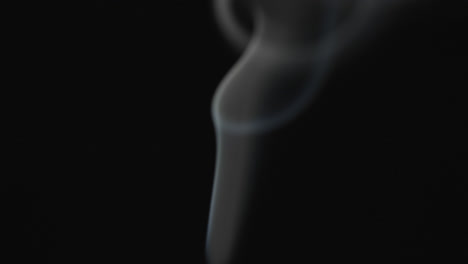 Video-of-close-up-of-matches-with-smoke-and-copy-space-on-black-background