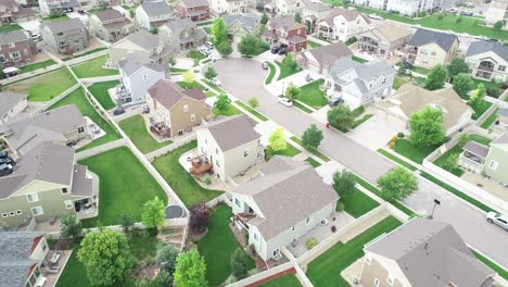 Suburbia-from-the-air-as-drone-flies-over-neighborhood