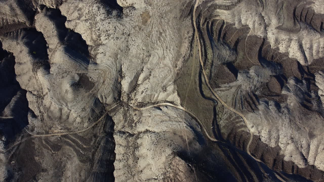 Aerial View of a Desert Landscape with Winding Roads