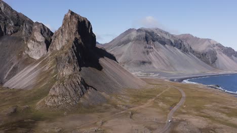 scenic mountain range eystrahorn in volcanic landscape of iceland, aerial