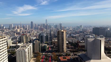 Aerial-view-over-streets-and-the-Pacific-heights-of-San-Francisco---reverse,-pan,-drone-shot