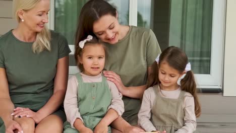 happy family portrait on porch