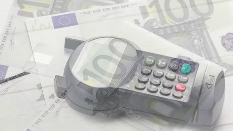 animation of euro banknotes falling over payment terminal